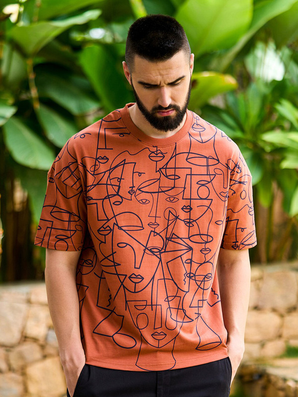 OWNED-N10 Stormborn burnt-orange drop-shoulder tee — P3 hero